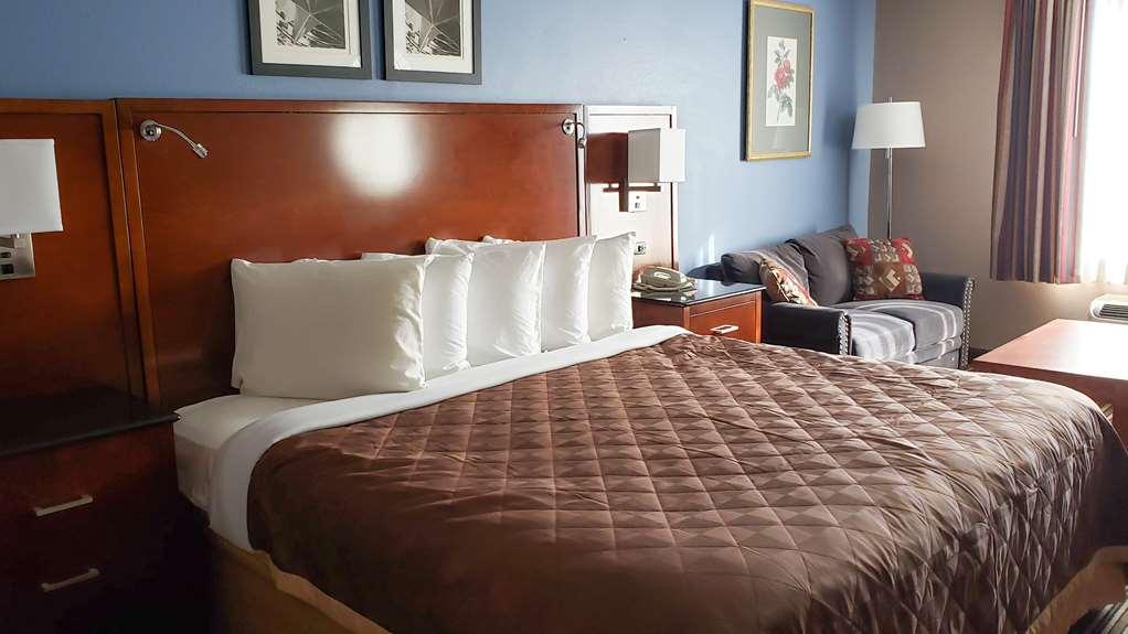 Americas Best Value Inn & Suites-Фолеи Стая снимка